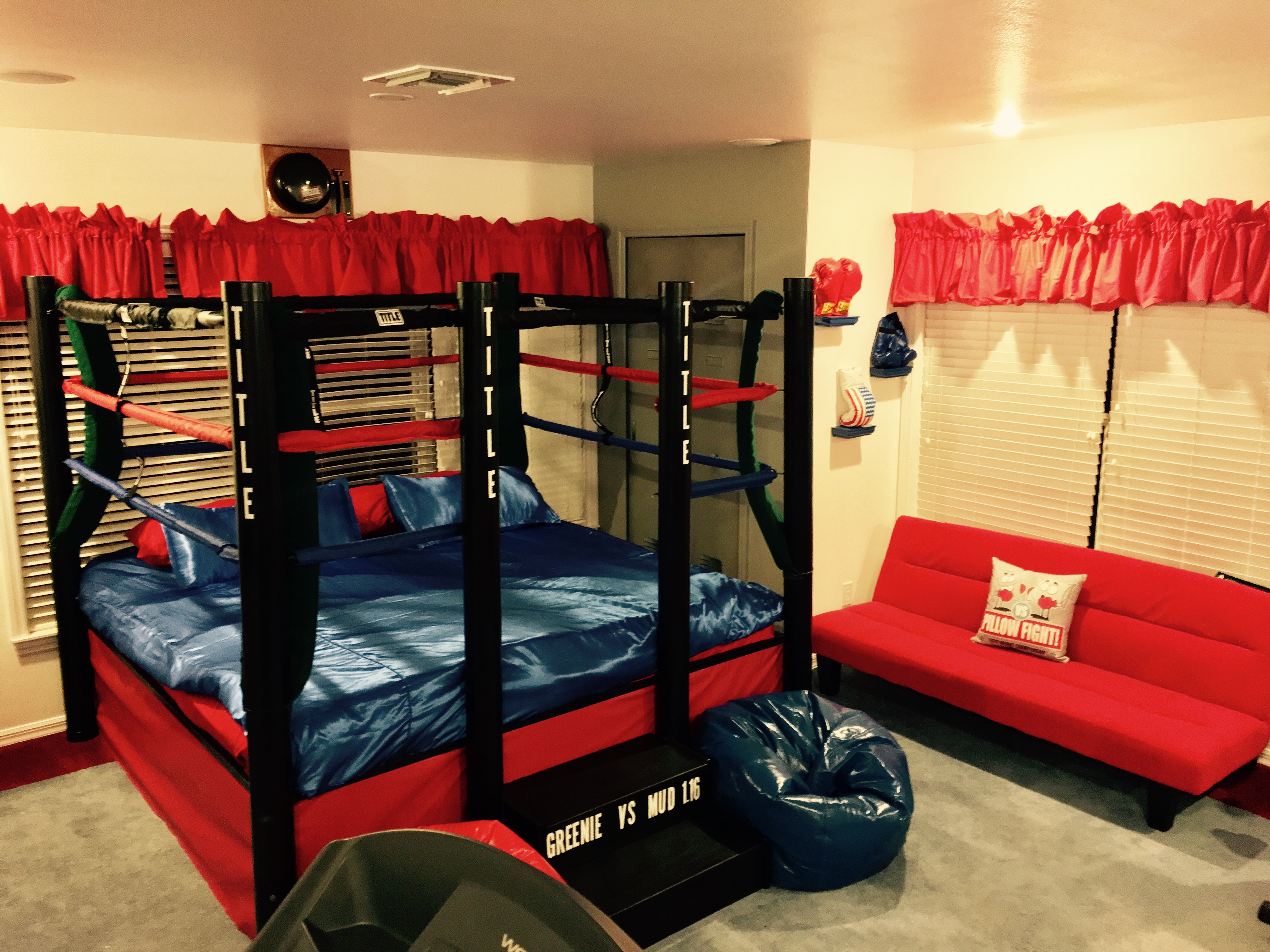 rocky home gym and bedroom with boxing ring bed